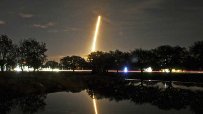 ct-spacex-secret-satellite-20180107-001